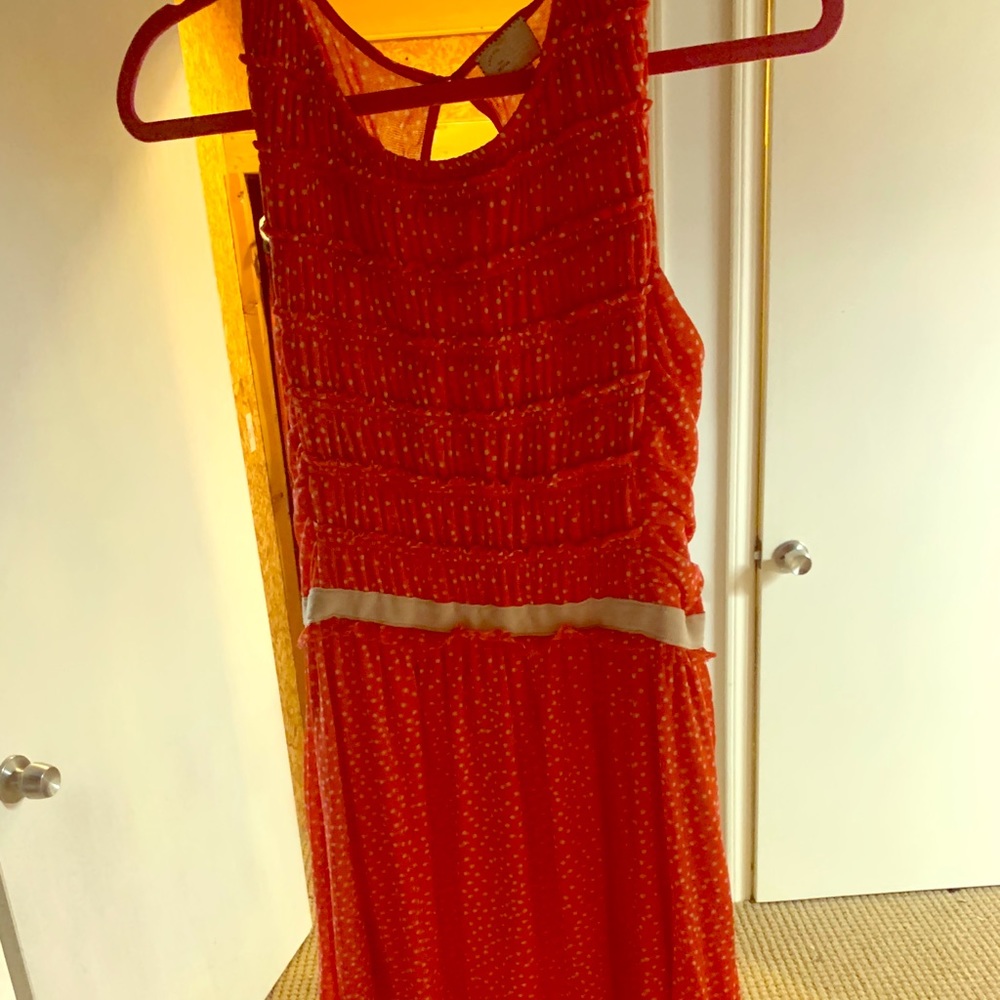 polka dotted dress in orange and white.